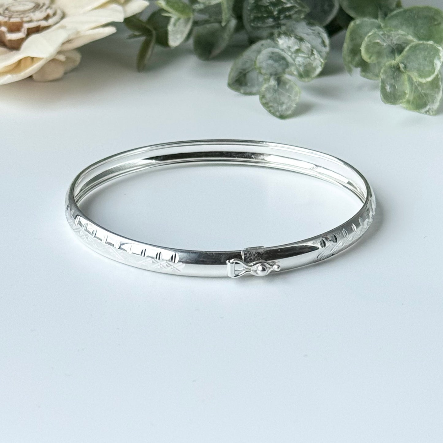 Sterling Silver Bangle Bracelet with Diamond Design