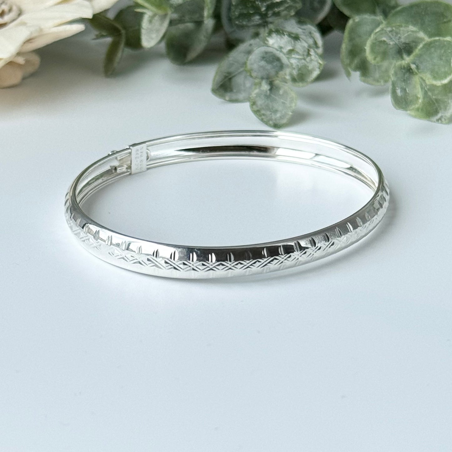 Sterling Silver Bangle Bracelet with Diamond Design